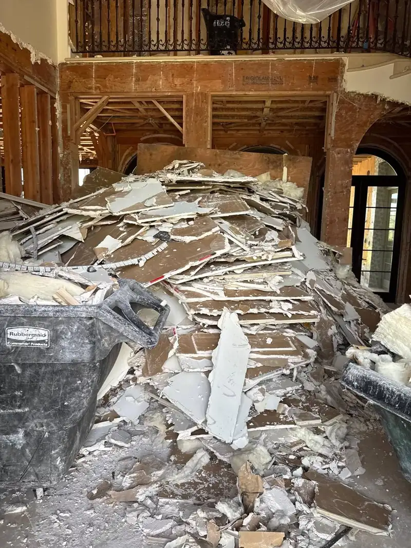Drywall and insulation removed from a large home