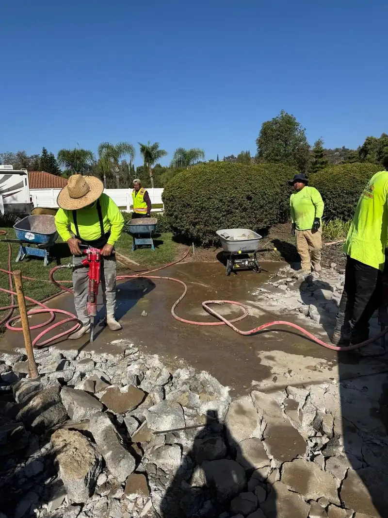 Concrete patio breakout with jackhammers
